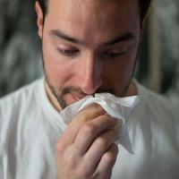 Male with cold.How To Avoid Summer Colds